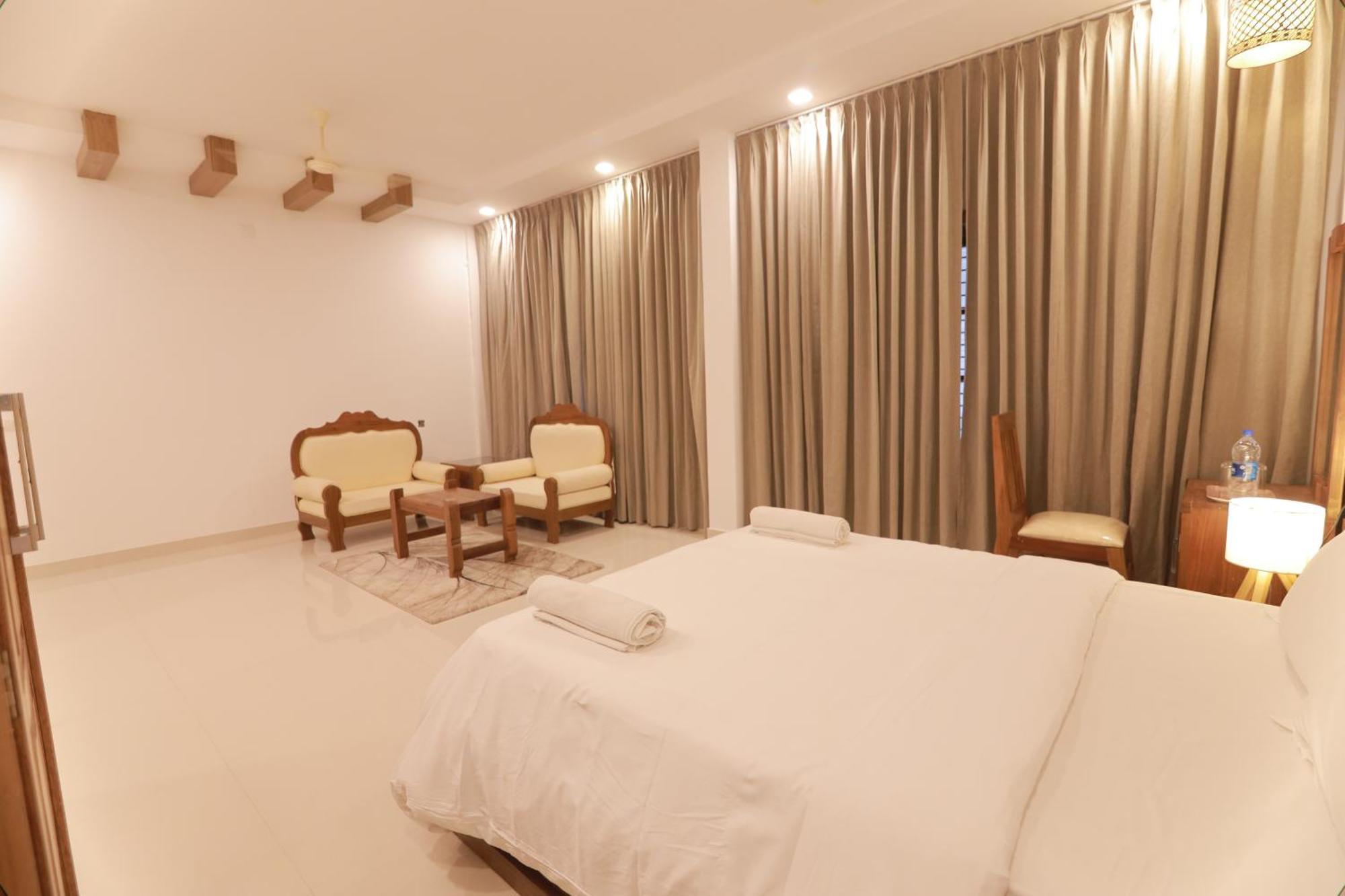 Opm Inn Payyannur Exterior foto