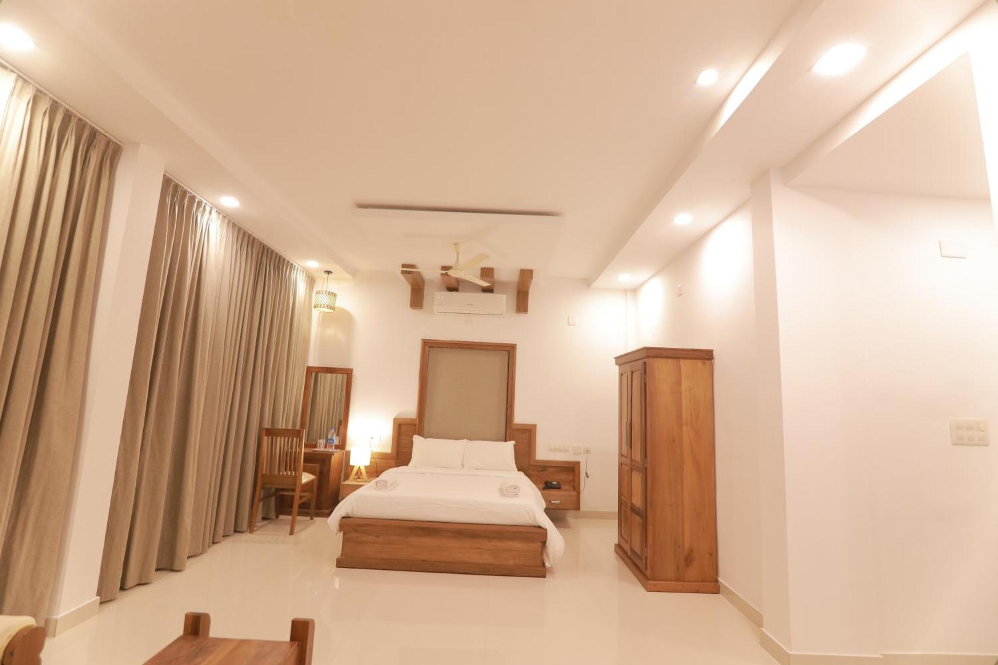 Opm Inn Payyannur Exterior foto