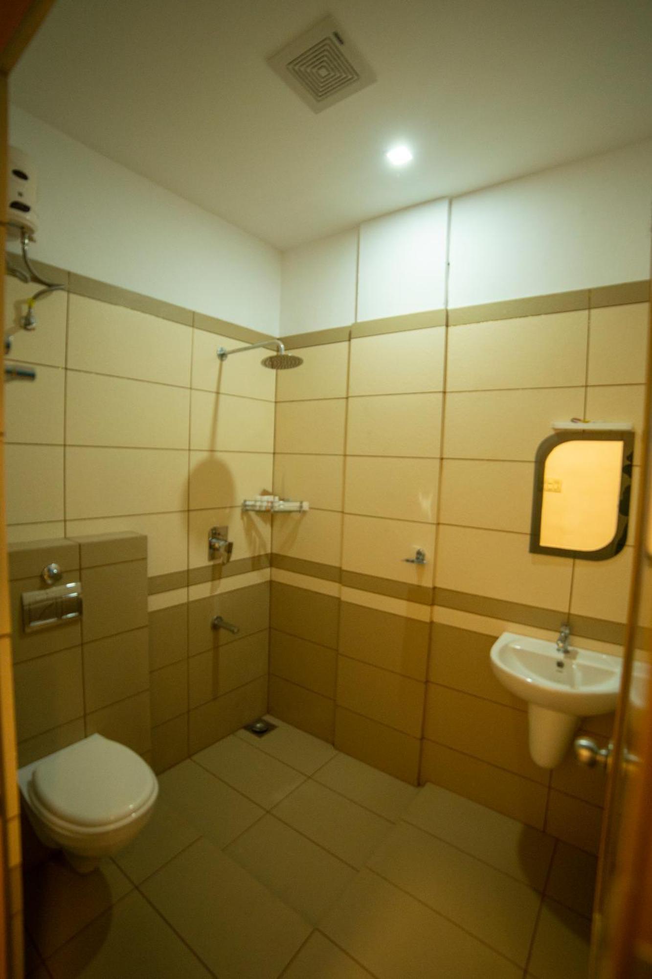 Opm Inn Payyannur Exterior foto